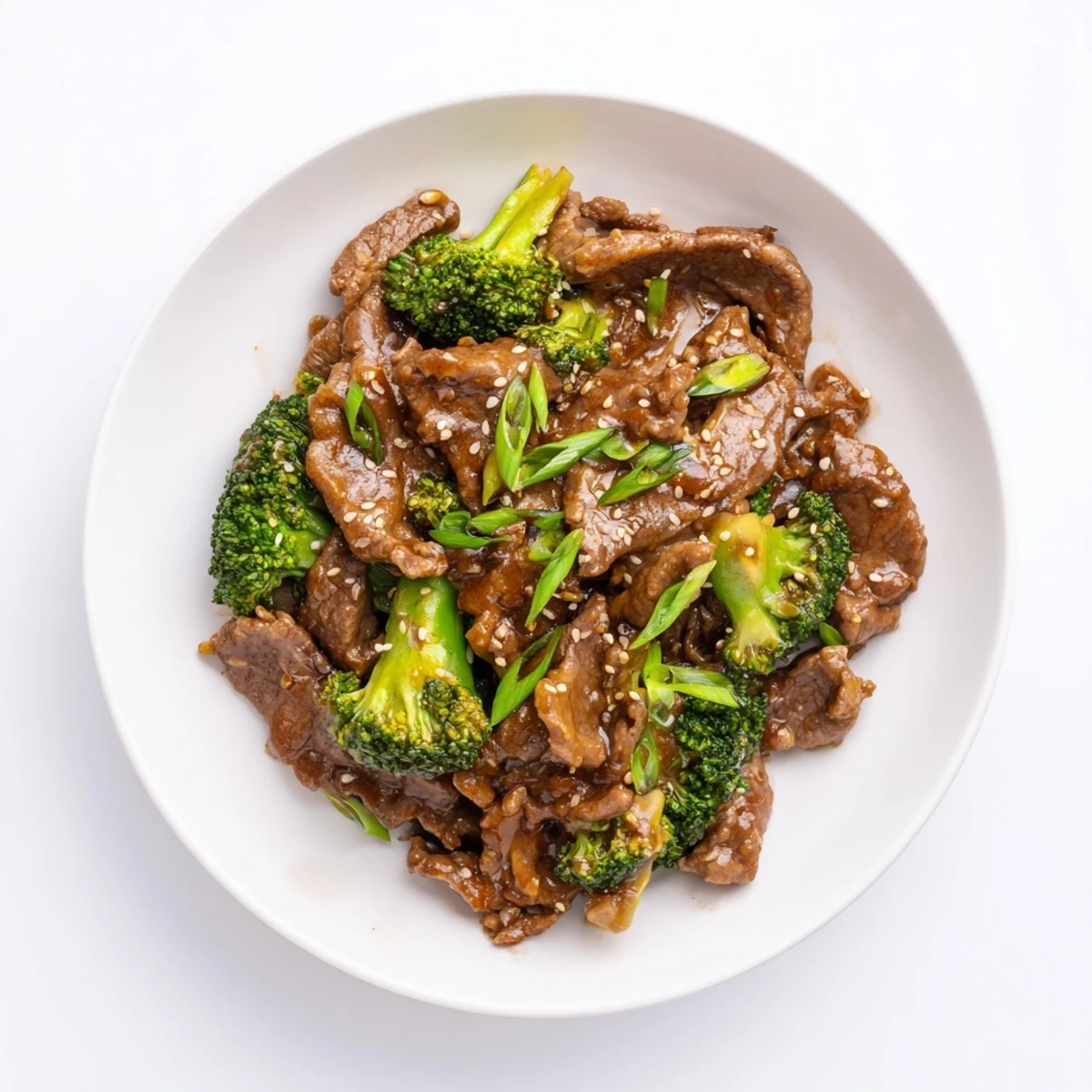 Succulent beef pieces and tender-crisp broccoli swimming in rich brown soy-ginger sauce, a delicious Instant Pot beef and broccoli dish