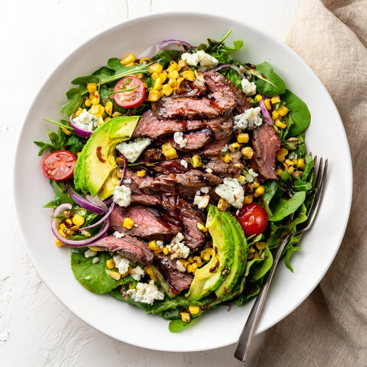 Crisp greens layered with creamy gorgonzola and grilled balsamic steak salad