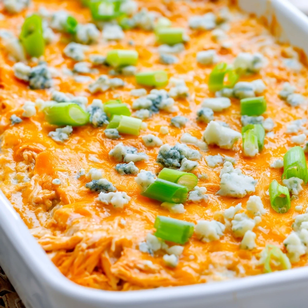 Golden bubbling Jalapeno Buffalo Chicken Casserole fresh from the oven with melted cheese
